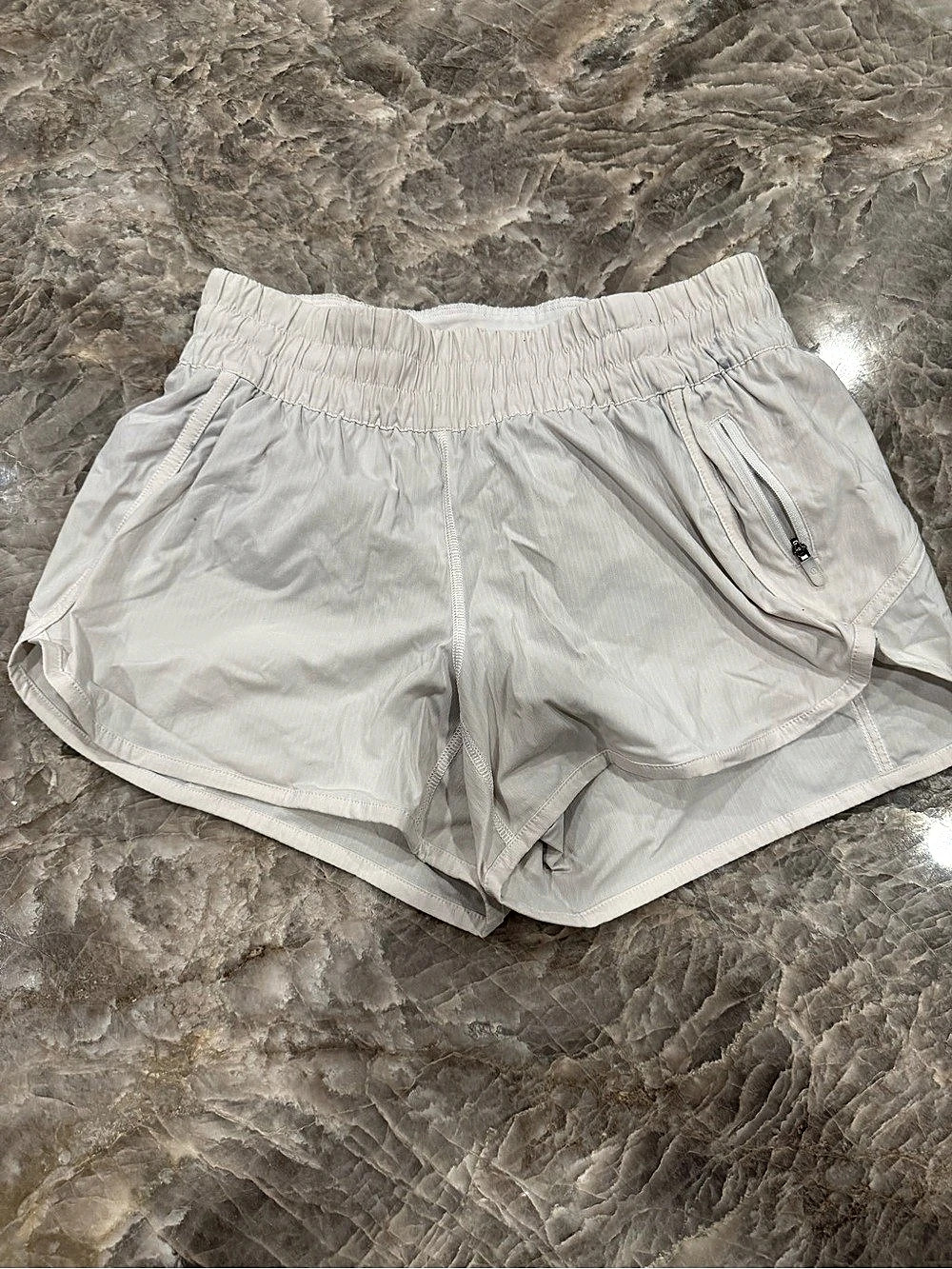 Lululemon White Lined Running Shorts Zip Pocket Size 8